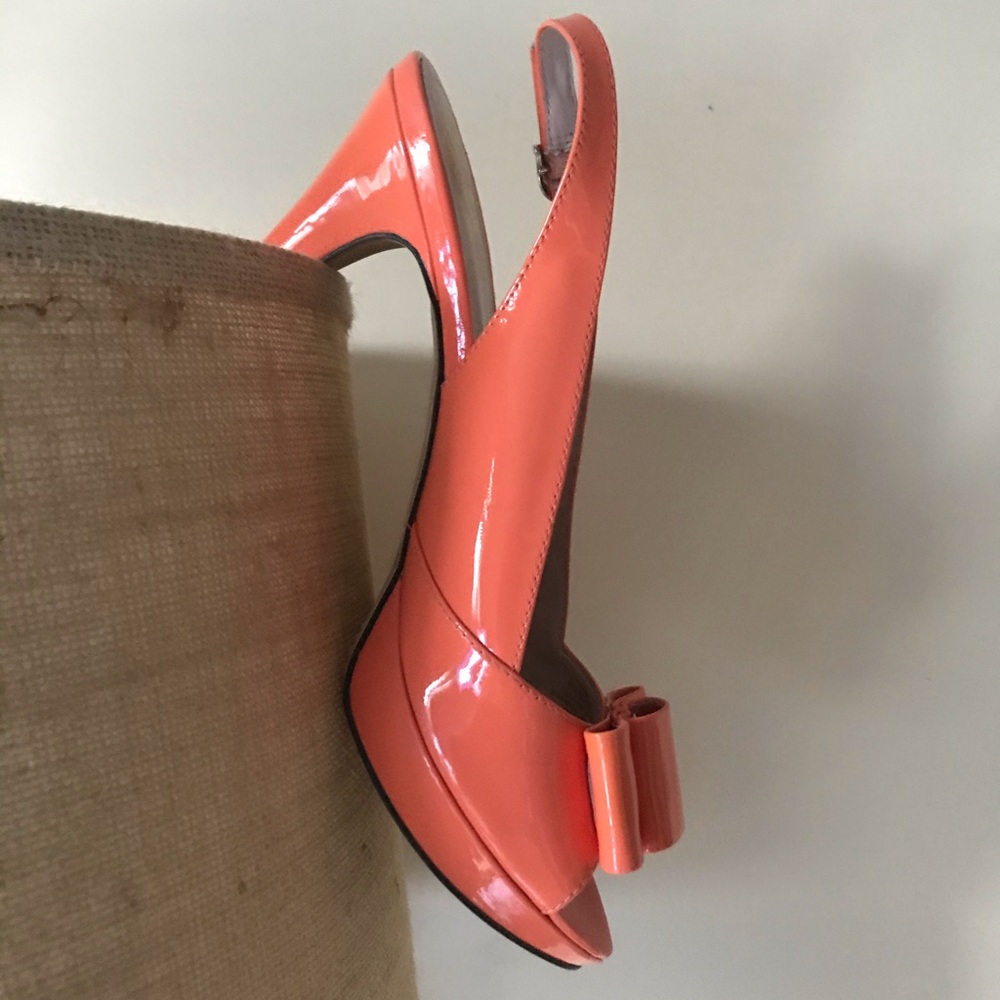 Patent leather peep toe pump